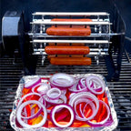 ROTO-Q 360 Sausage Rotisserie cooking sausages on a grill with a foil tray of sliced red onions and peppers.