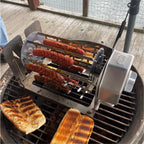 ROTO-Q 360 Sausage Rotisserie cooking scored hot dogs on an outdoor grill with toasted buns.