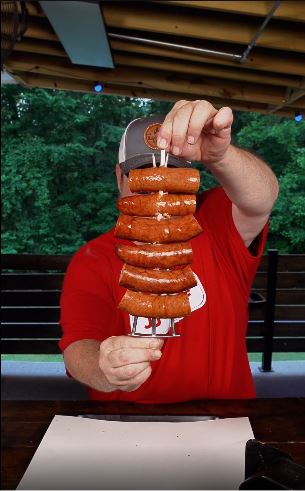 Step 2 — Load the RotoQ 360: Place the sausages onto the RotoQ 360 th
