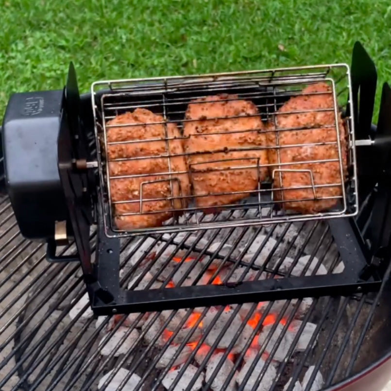 Chicken breasts grilling in a ROTO-Q 360 Flatspin basket over charcoal