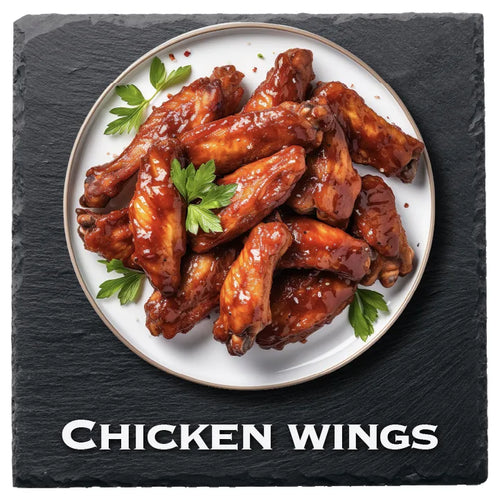 Glazed chicken wings garnished with parsley