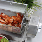 Seasoned chicken wings inside an open ROTO-Q 360 round rotisserie basket
