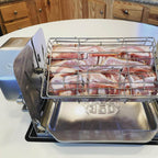 Raw bacon strips arranged inside a ROTO-Q 360 Rotisserie Cage (Flat) attachment.